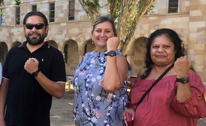 Sleep coaches Jamie Dunne and Karen Chong and Cultural Advisor Roslyn Von Senden hold up monitoring watches